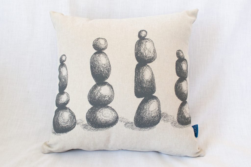 Stacked Stones drawing screen printed onto a cushion. Photo by Rebecca Angela