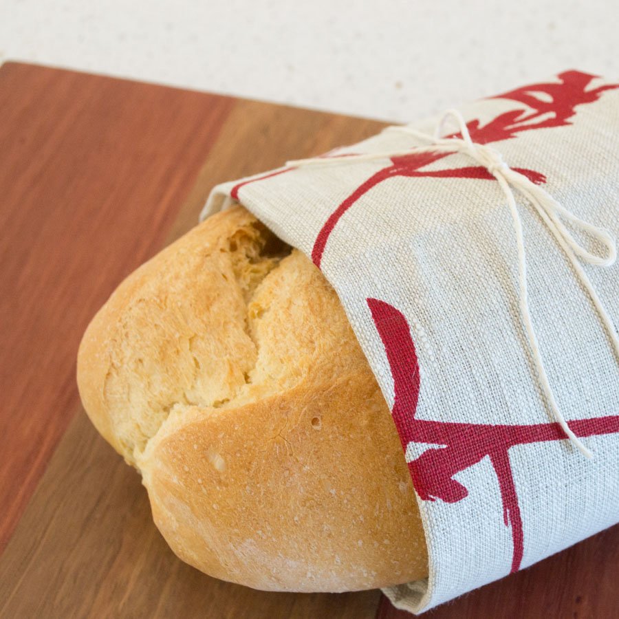 Bread wrapped in tea towel